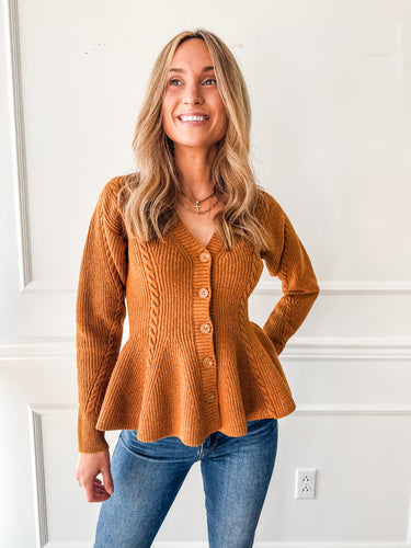 Courtney Pumpkin Peplum Sweater by Steve Madden