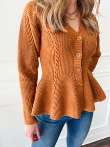 Courtney Pumpkin Peplum Sweater by Steve Madden