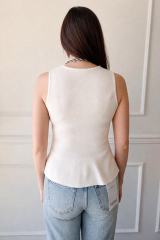 The Sutton White Peplum Knit Top