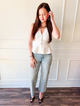The Sutton White Peplum Knit Top