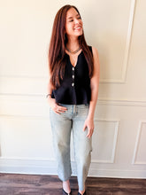 The Sutton Black Peplum Knit Top