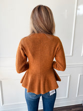 Courtney Pumpkin Peplum Sweater by Steve Madden